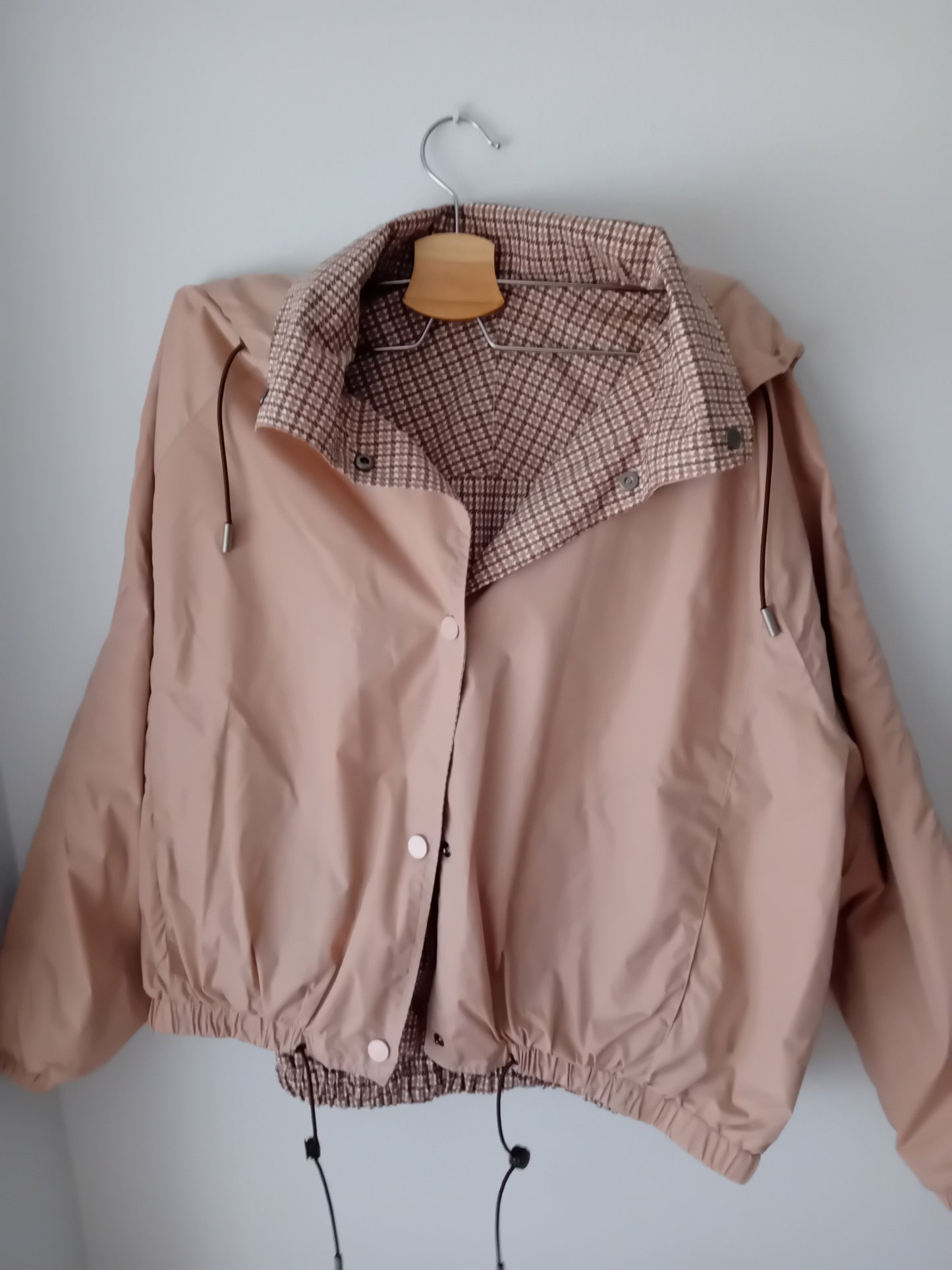 Nude colored mid-season reversible jacket