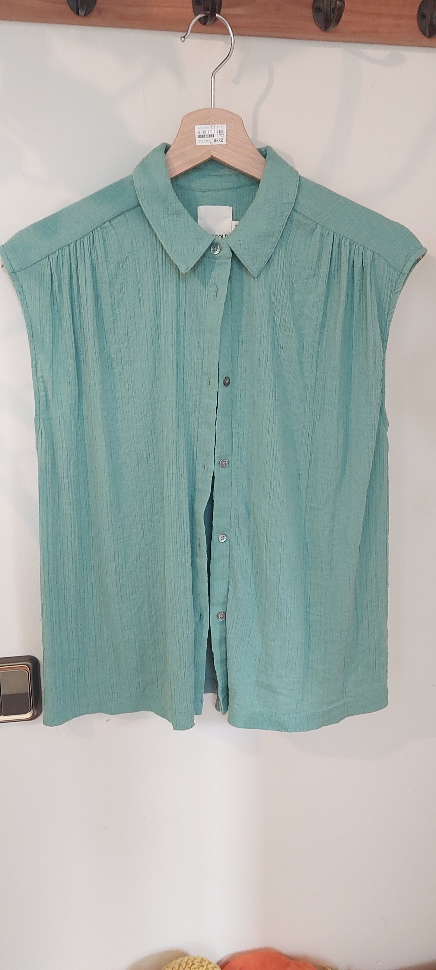 Camisa azul sin mamgas