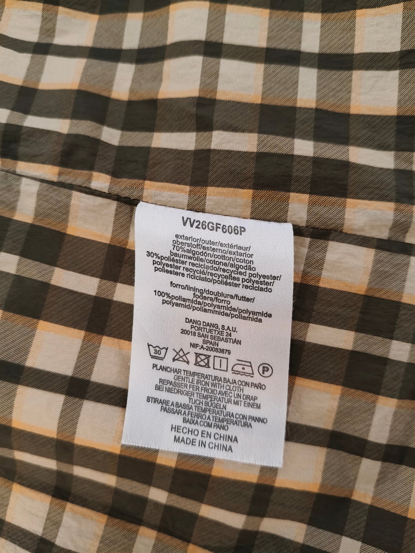 Oversized trench coat with checked lining