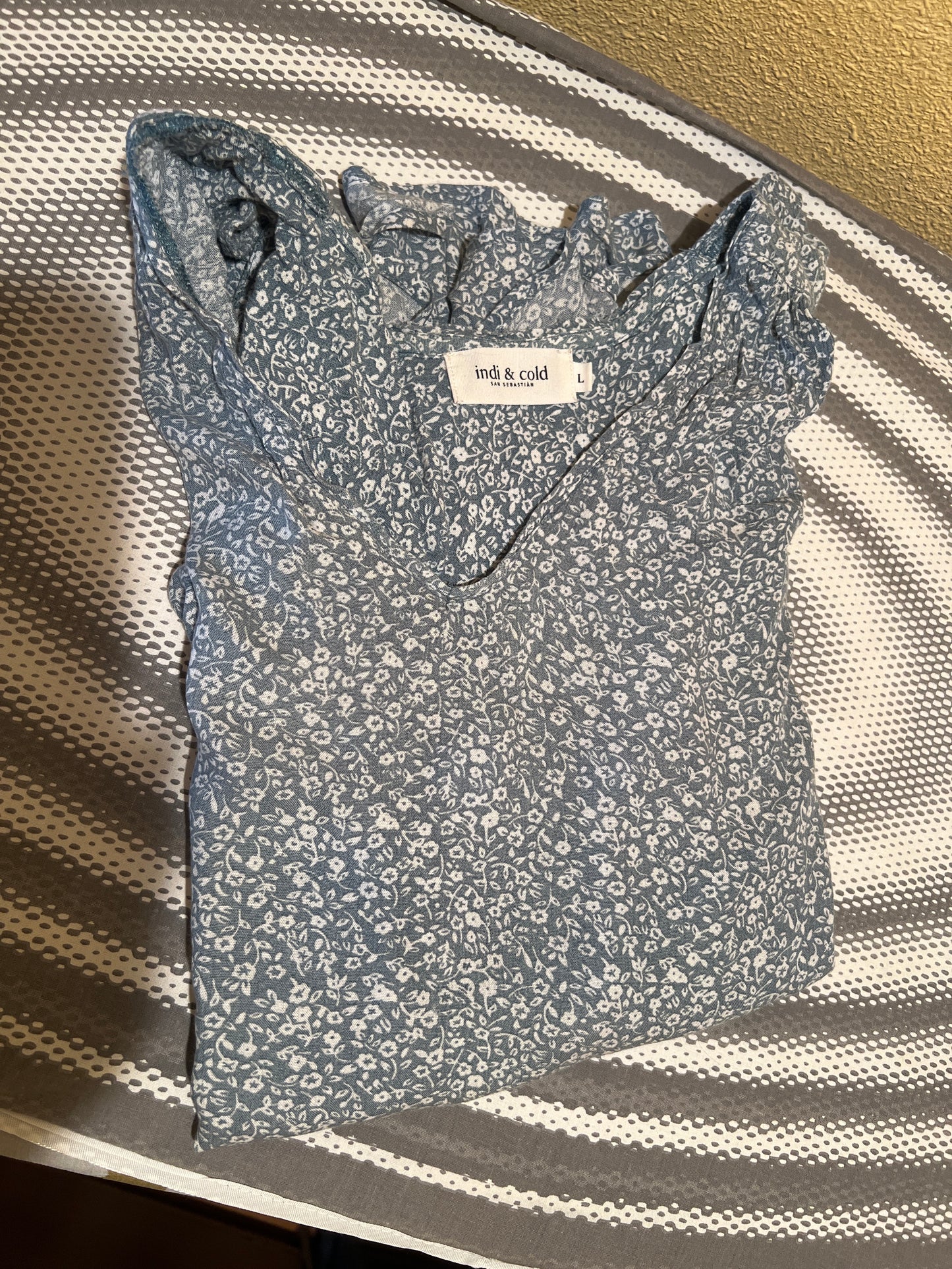 Aqua green T-shirt with white flowers