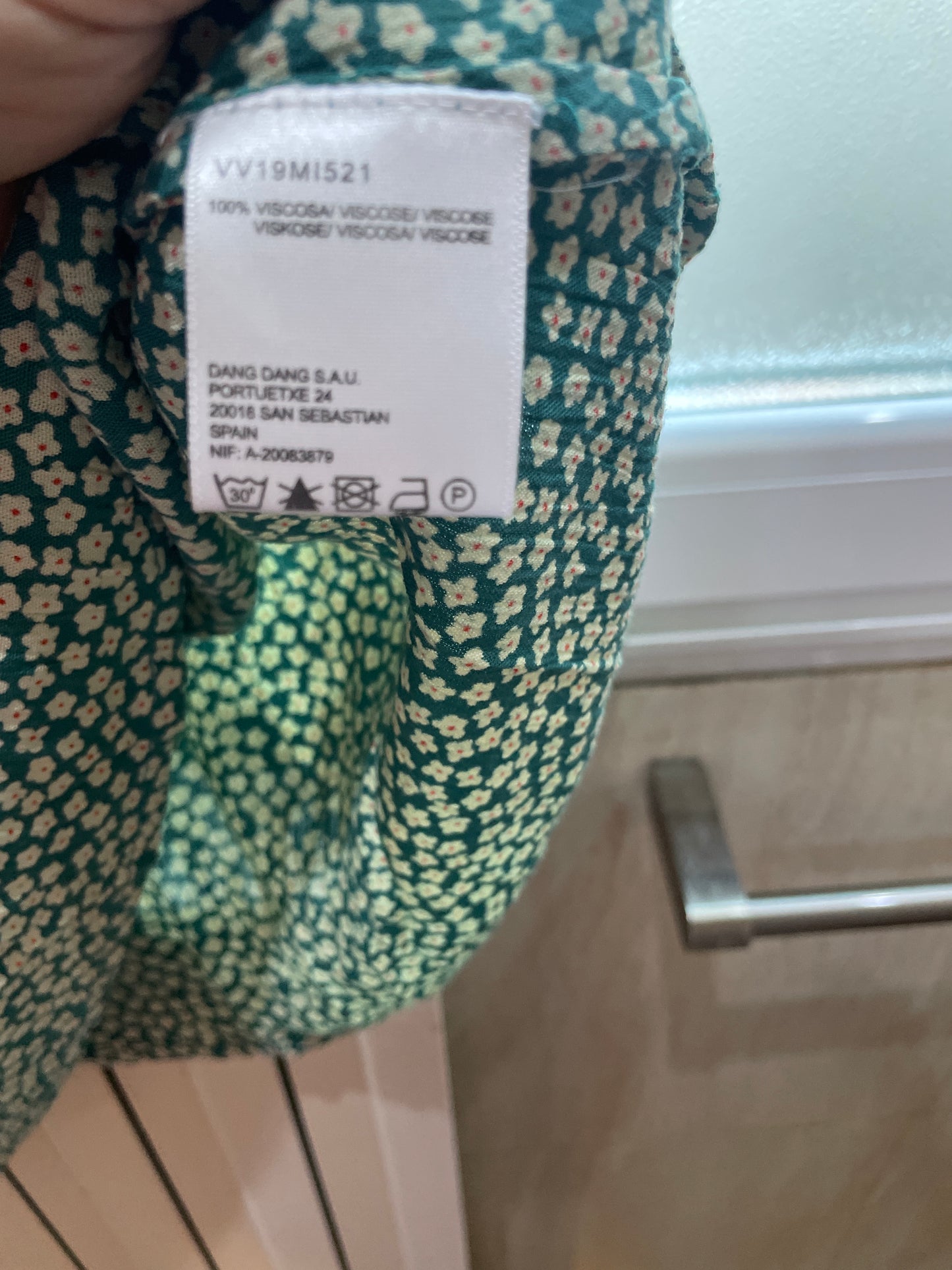 Blouse verte à marguerites