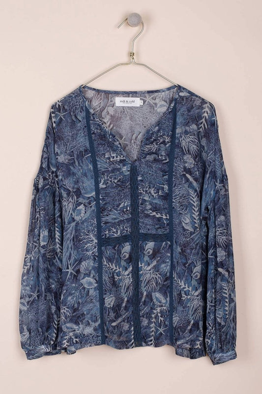 Blouse imprimée fond bleu marine