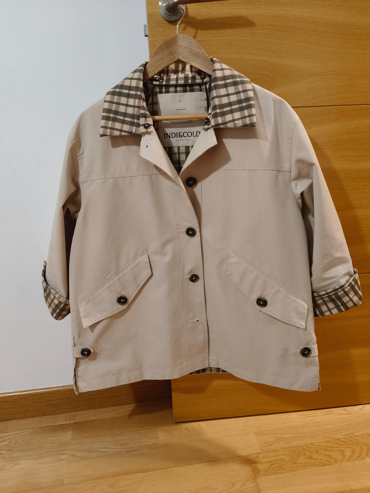 Oversized trench coat with checked lining