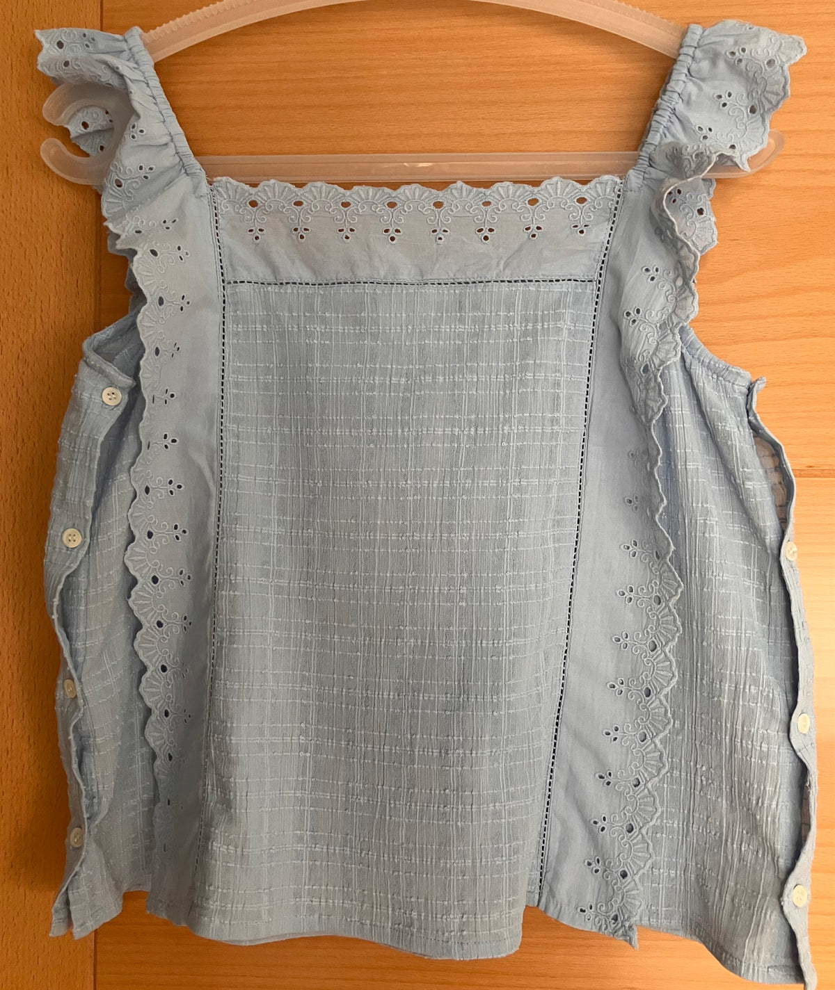 Blue strappy blouse with embroidery