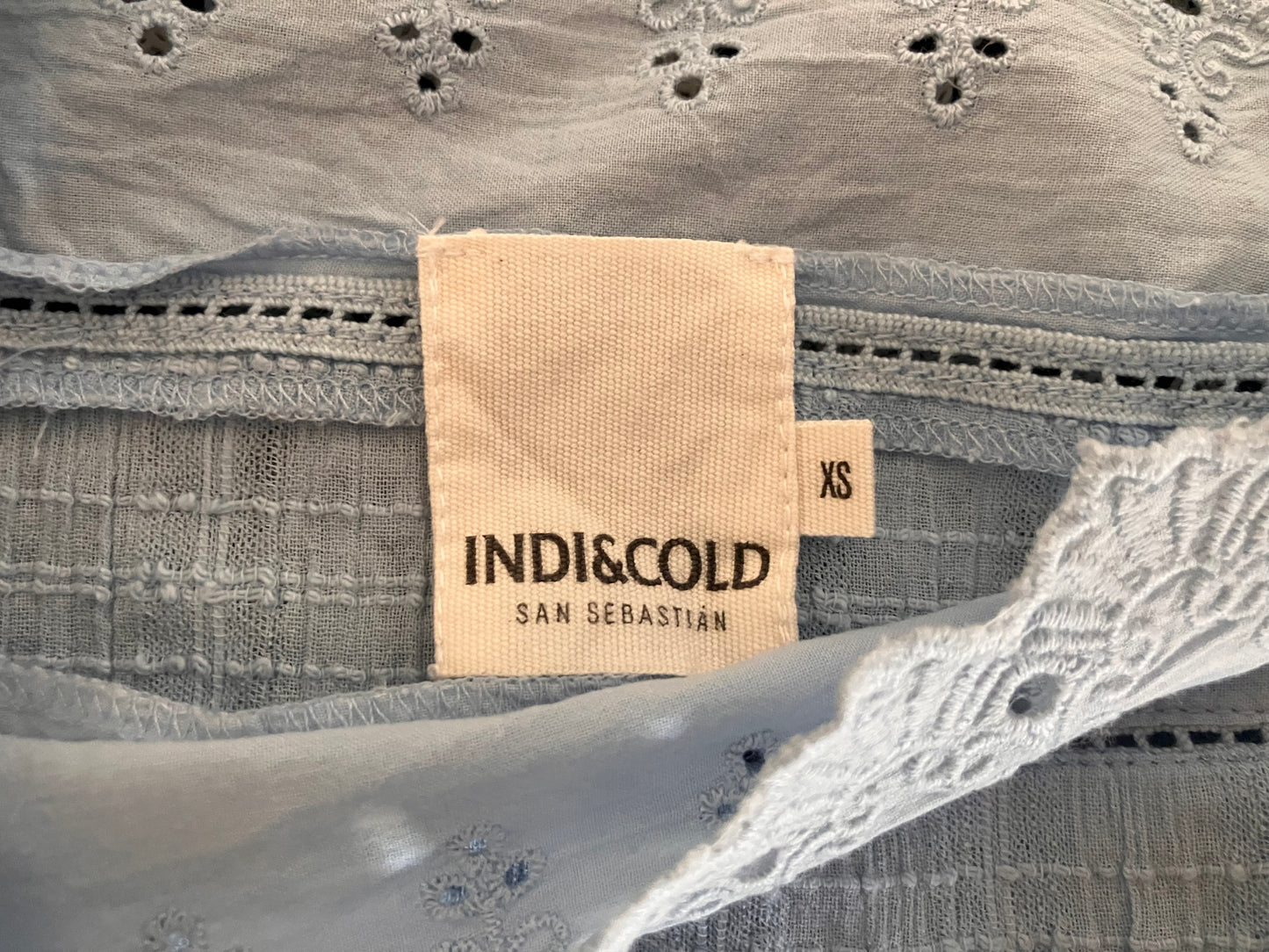 Blue strappy blouse with embroidery