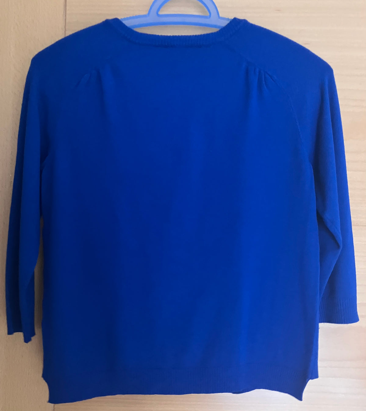Light blue summer jacket with three-quarter sleeves