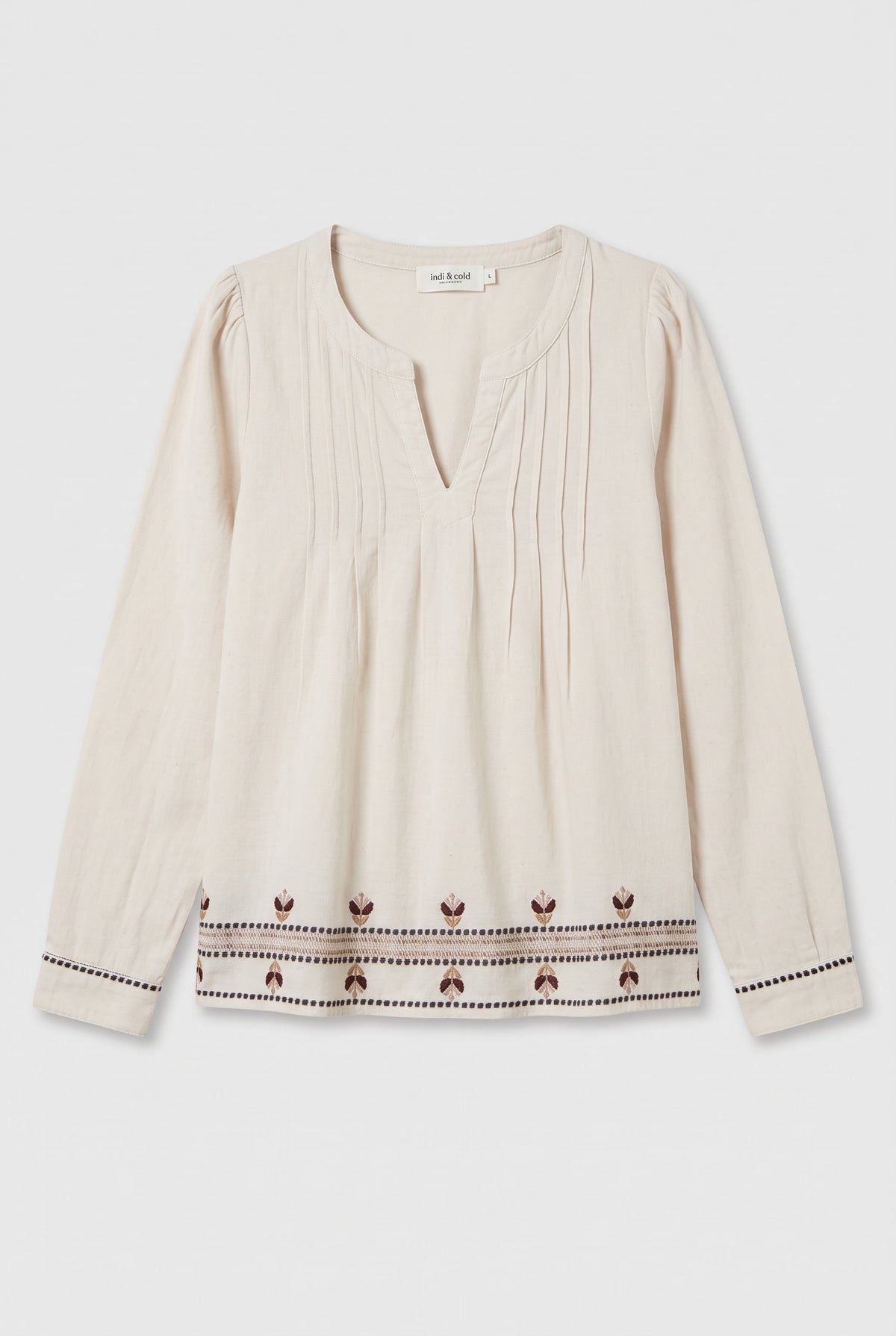 Blouse with embroidery at the hem