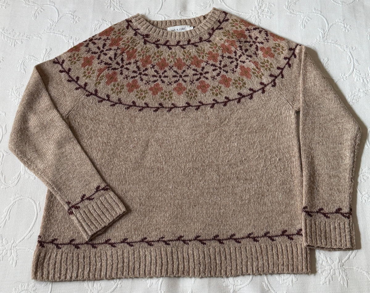 Pull beige avec bordure florale