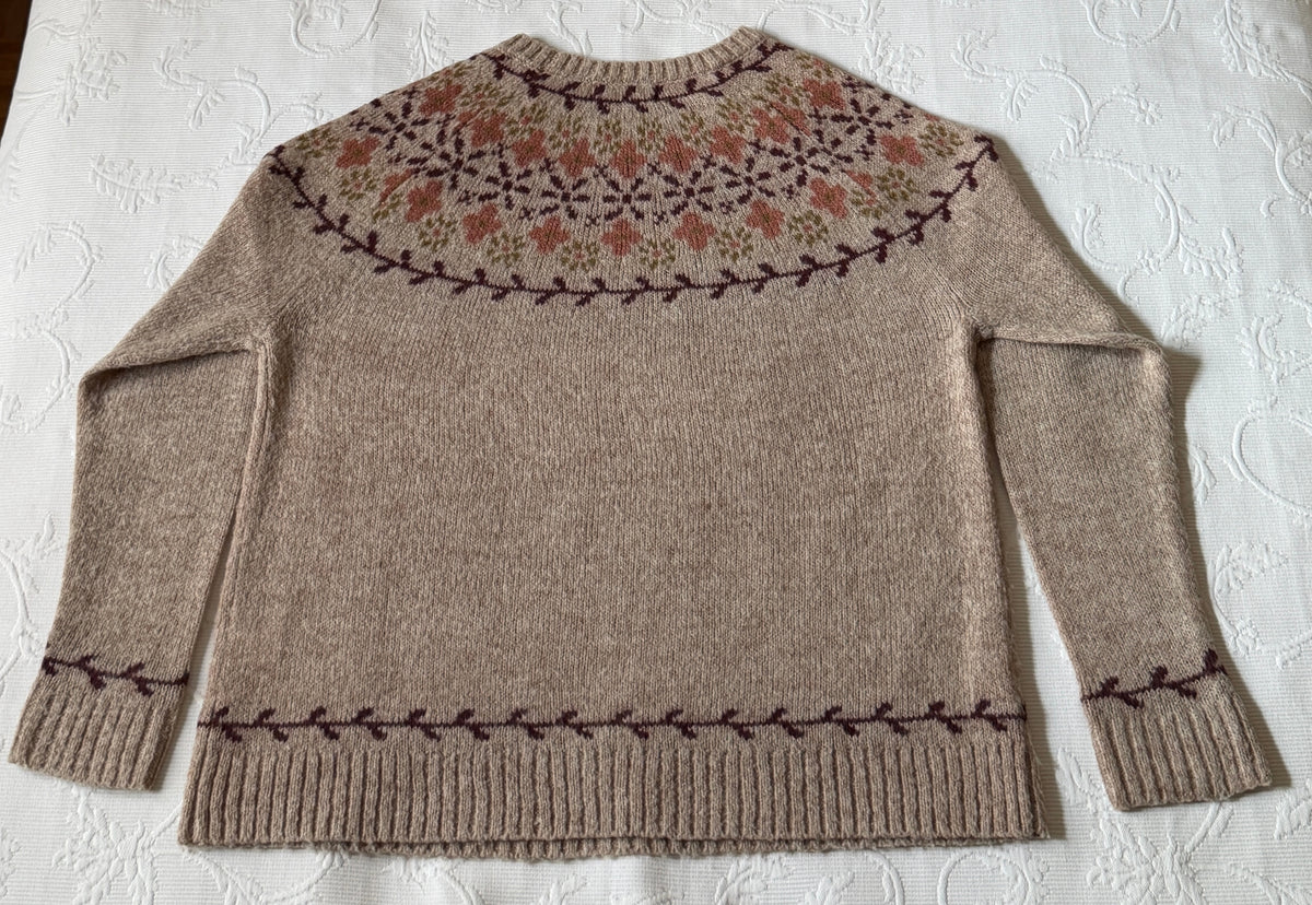 Pull beige avec bordure florale