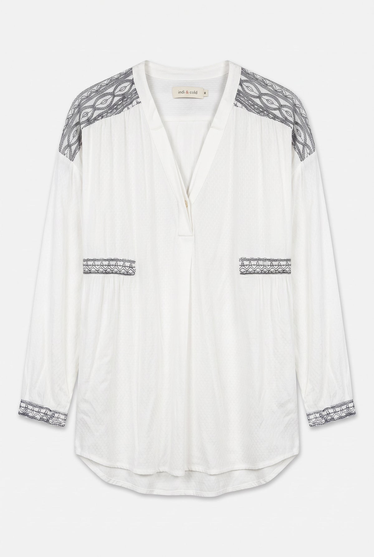 Camisa blanca étnica