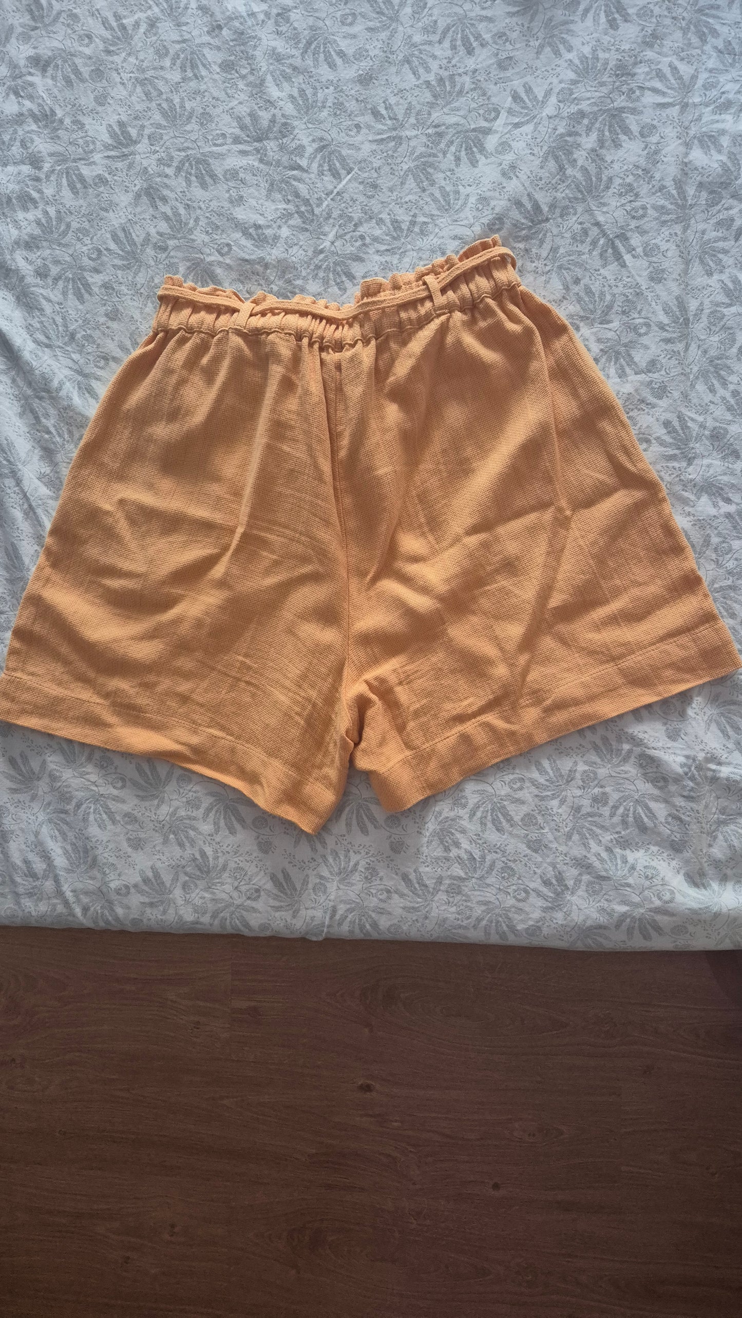Orange Bermuda shorts