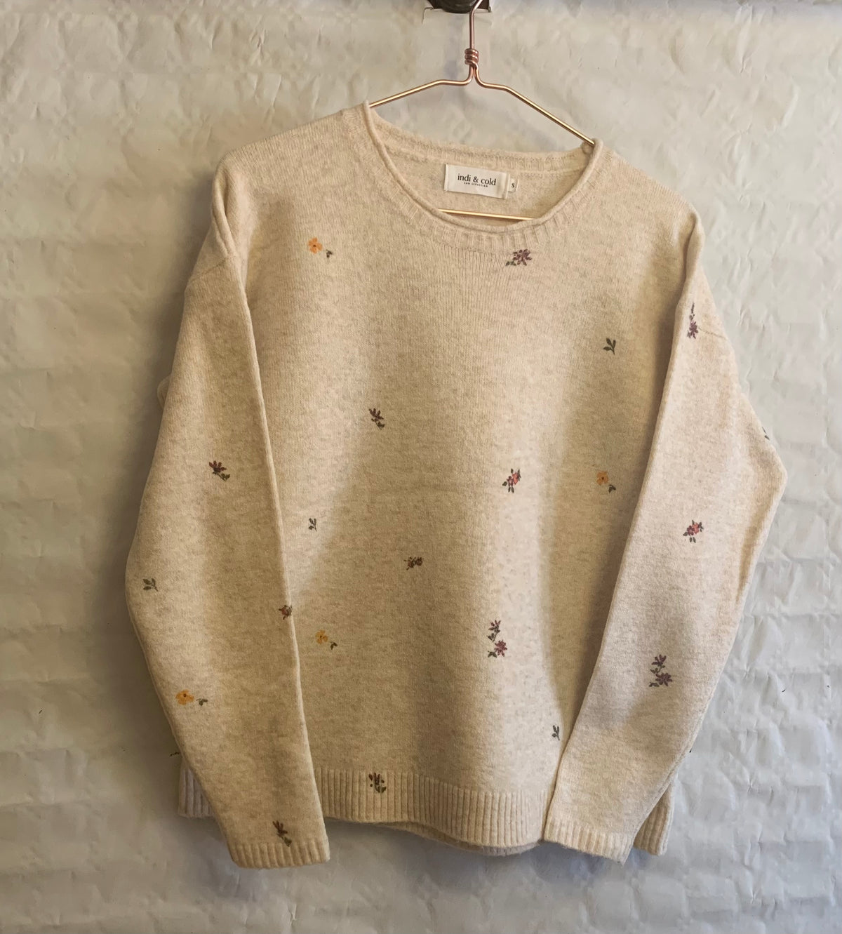 Jersey beige con flores