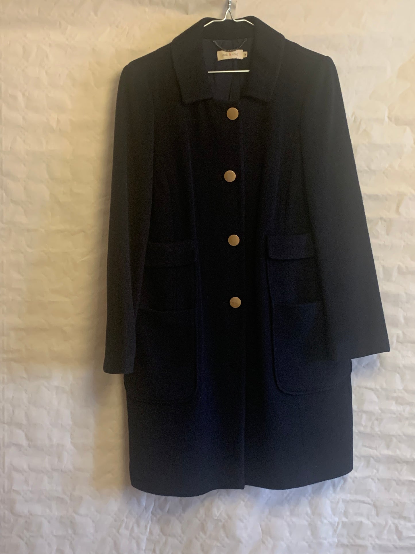 Abrigo azul botonadura dorada