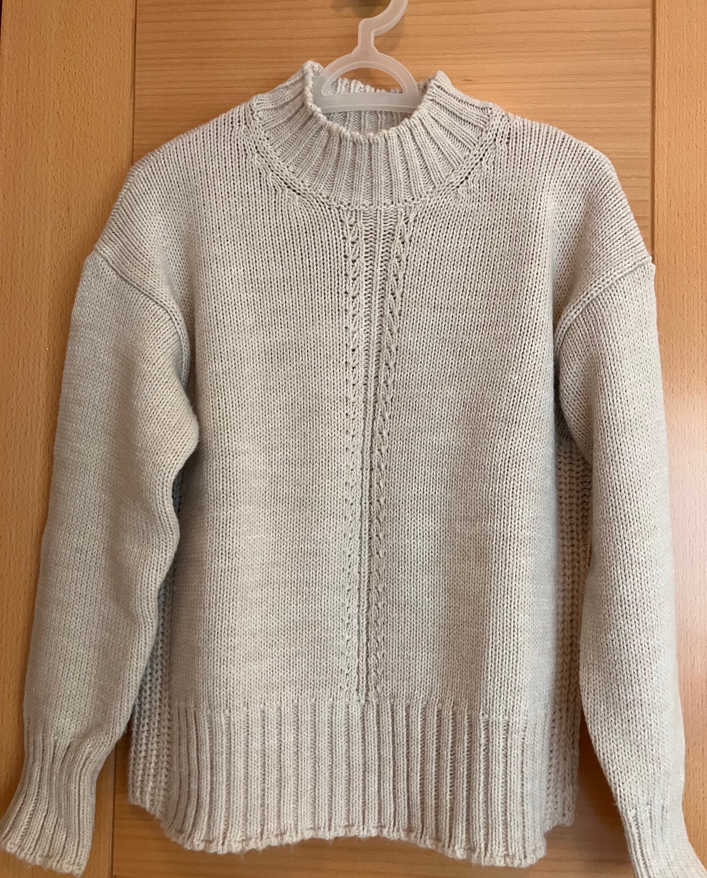 Jersey lana calados cuello chimenea blanco roto