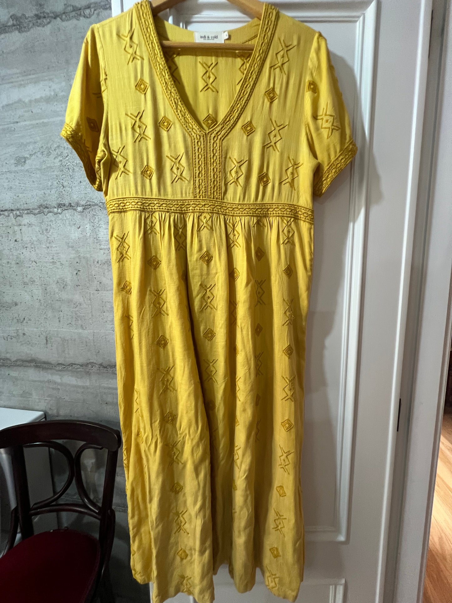 Mustard-colored embroidered dress