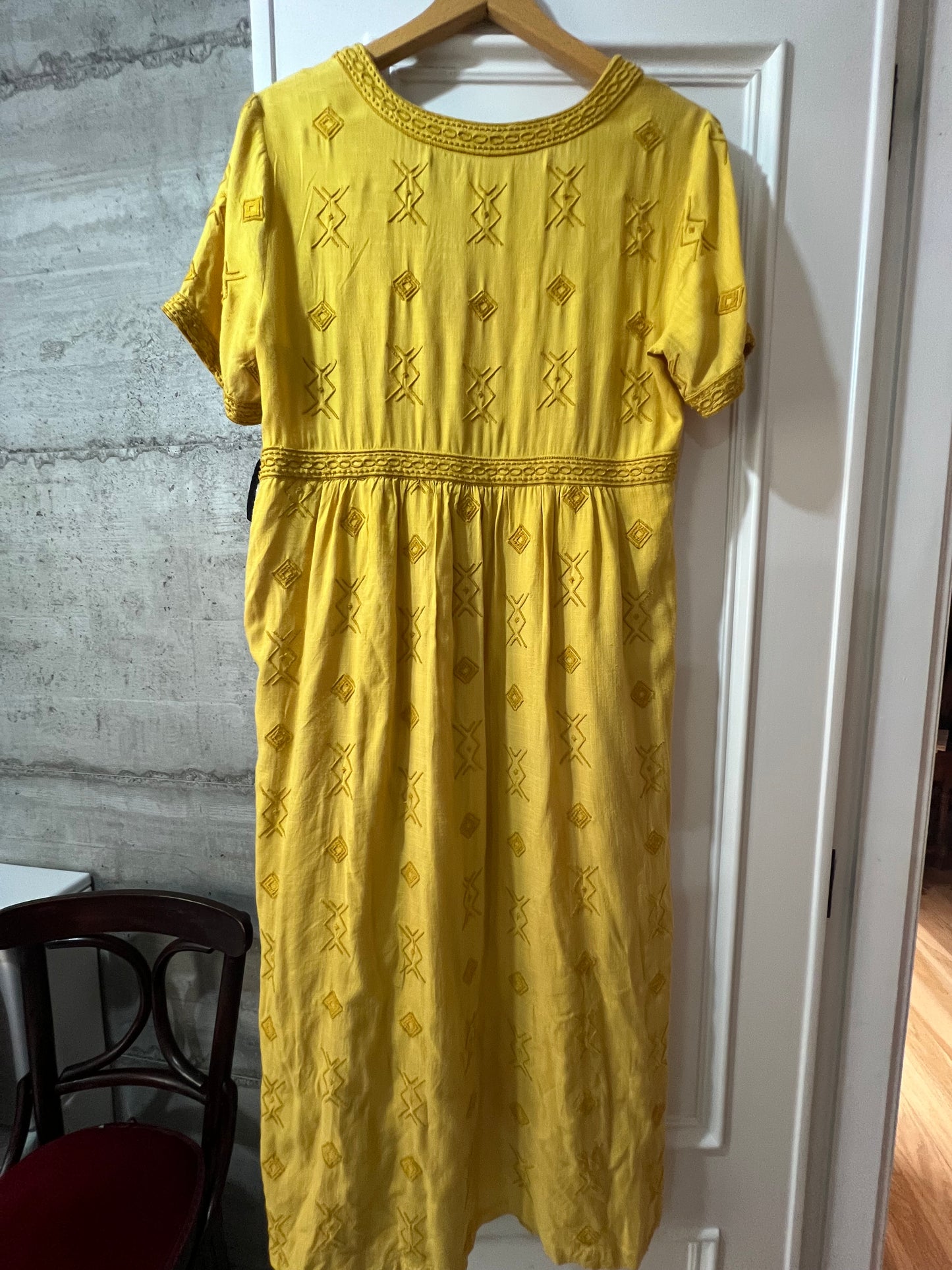 Mustard-colored embroidered dress