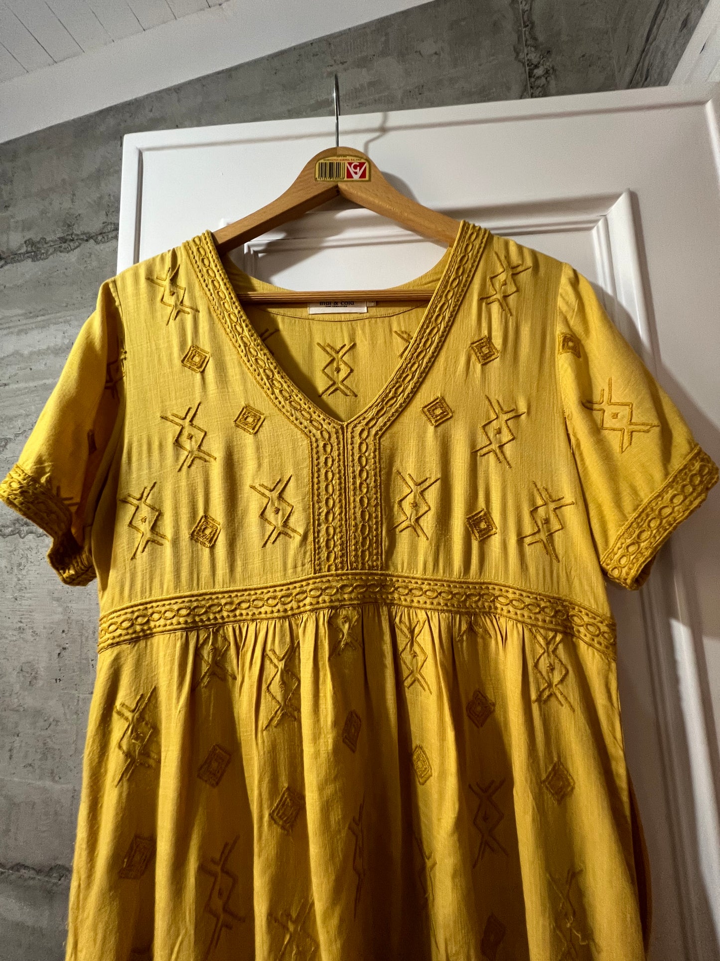 Mustard-colored embroidered dress