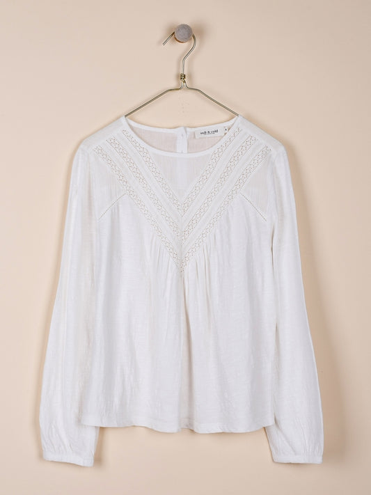 CAMISETA CON BORDADOS AL TONO