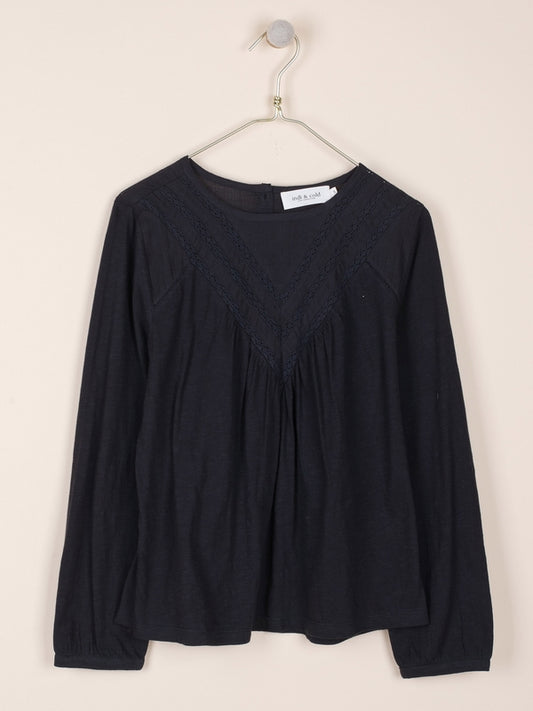 CAMISETA CON BORDADOS AL TONO