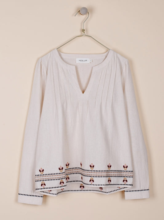 BLUSA CON BORDADOS EN CONTRASTE