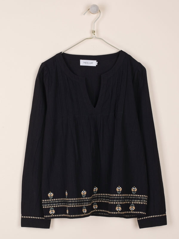 BLUSA CON BORDADOS EN CONTRASTE