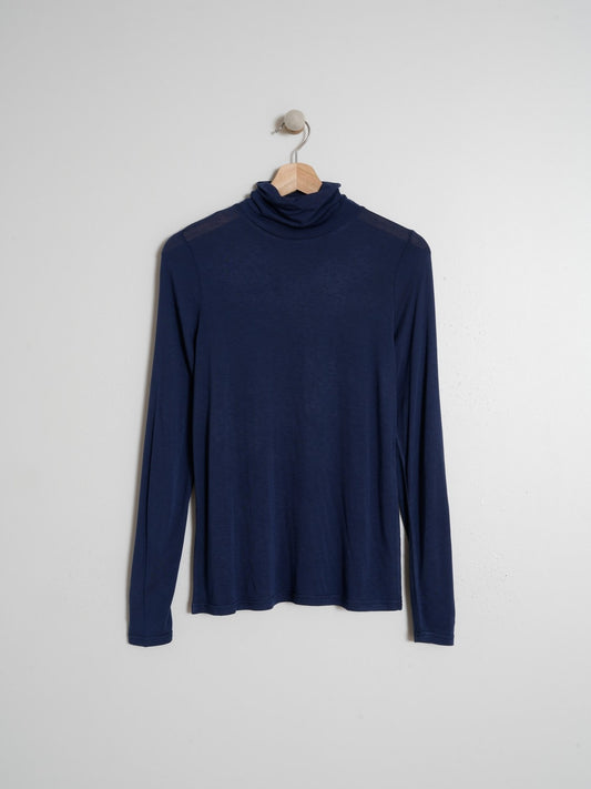 CAMISETA CUELLO VUELTO
