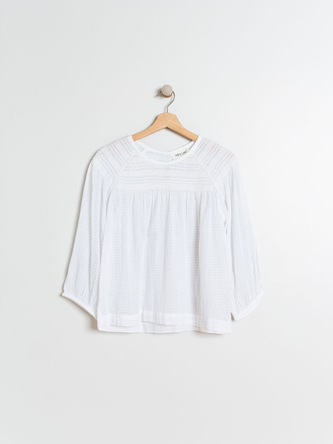 BLUSA CON  ENGOMADOS