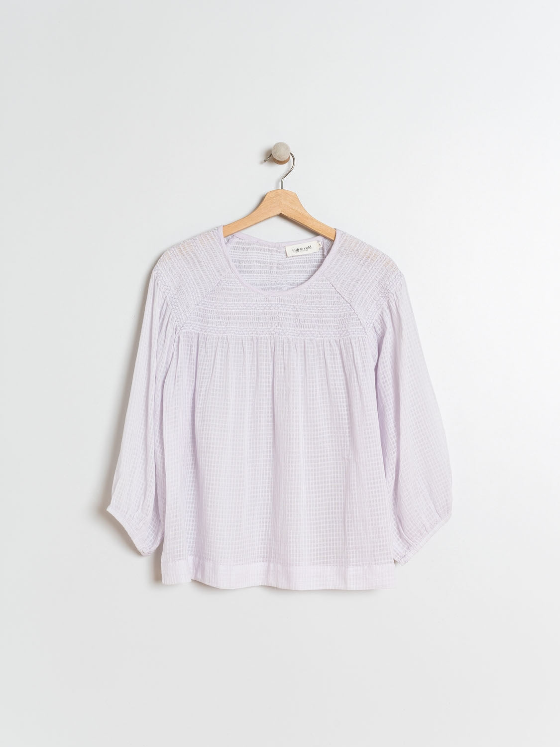 BLUSA CON  ENGOMADOS