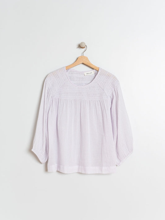 BLUSA CON  ENGOMADOS