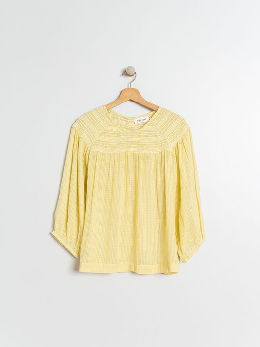 BLUSA CON  ENGOMADOS