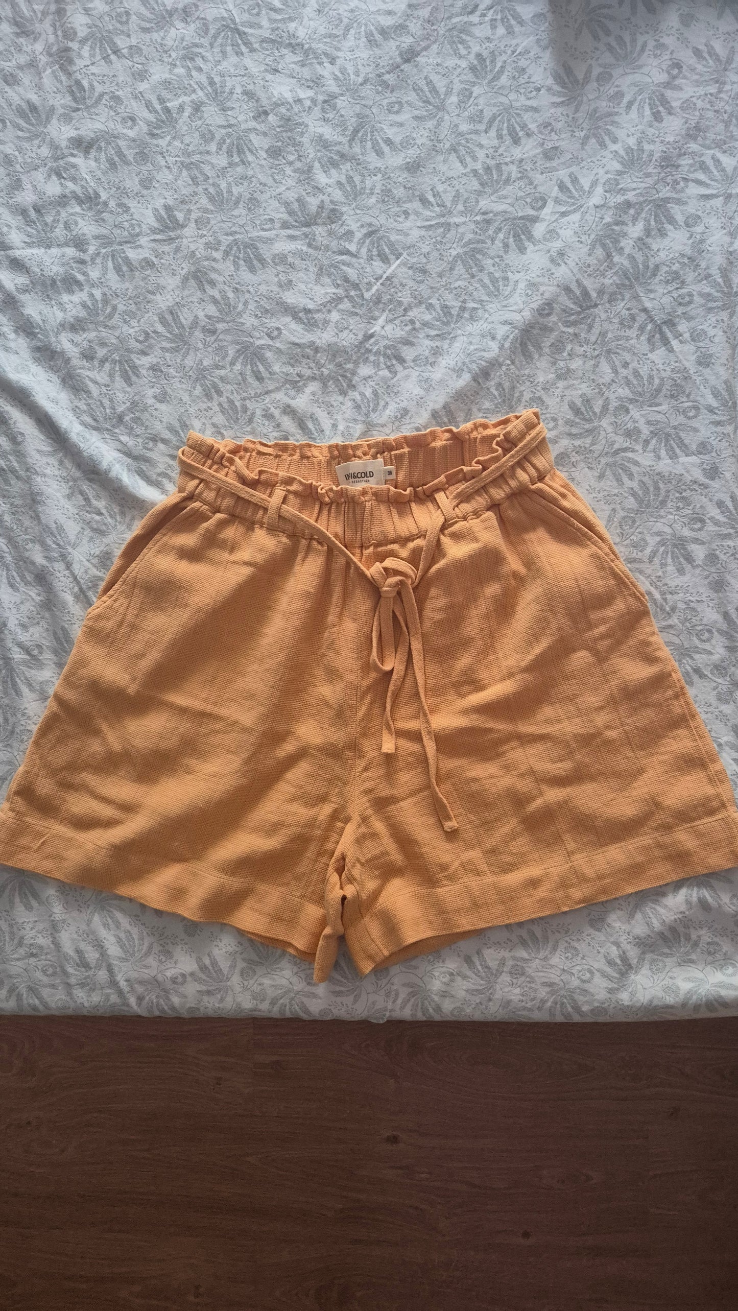 Orange Bermuda shorts