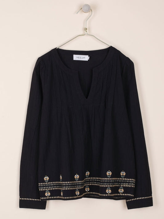BLUSA CON BORDADOS EN CONTRASTE