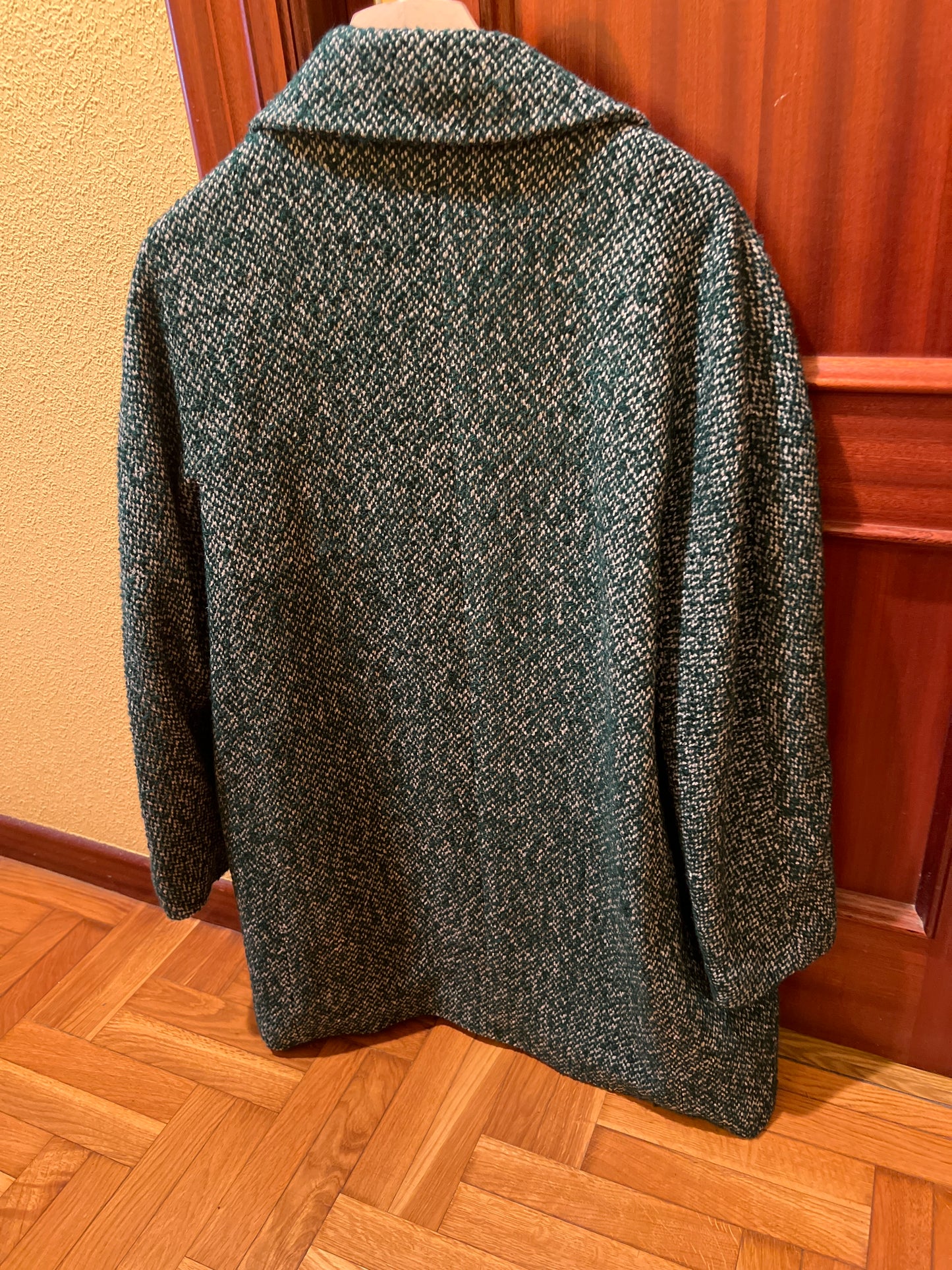 Speckled green coat