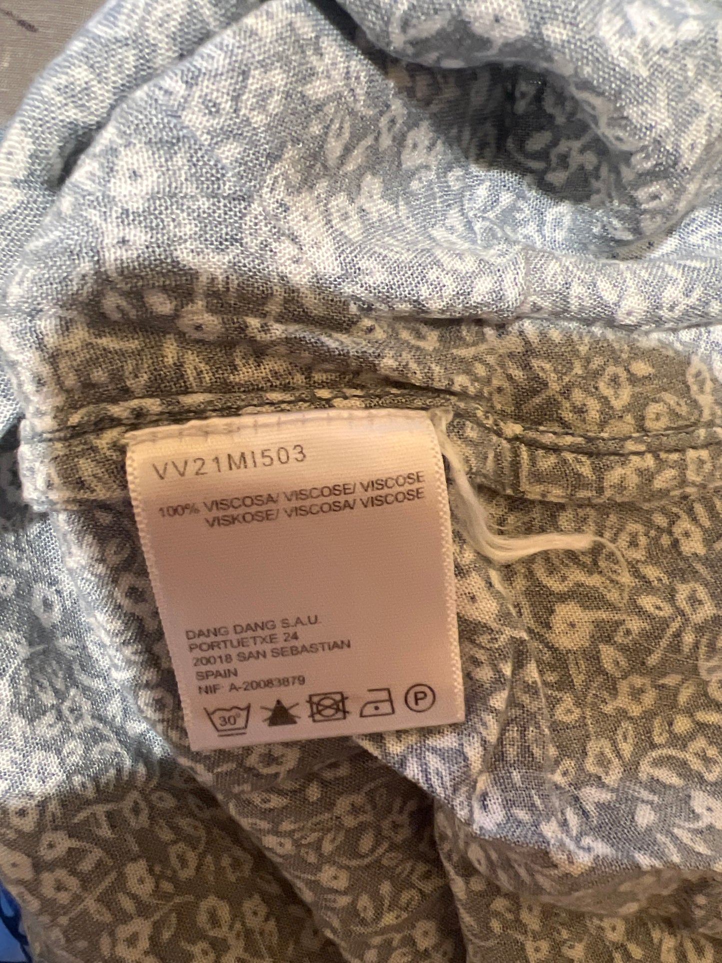 Aqua green T-shirt with white flowers