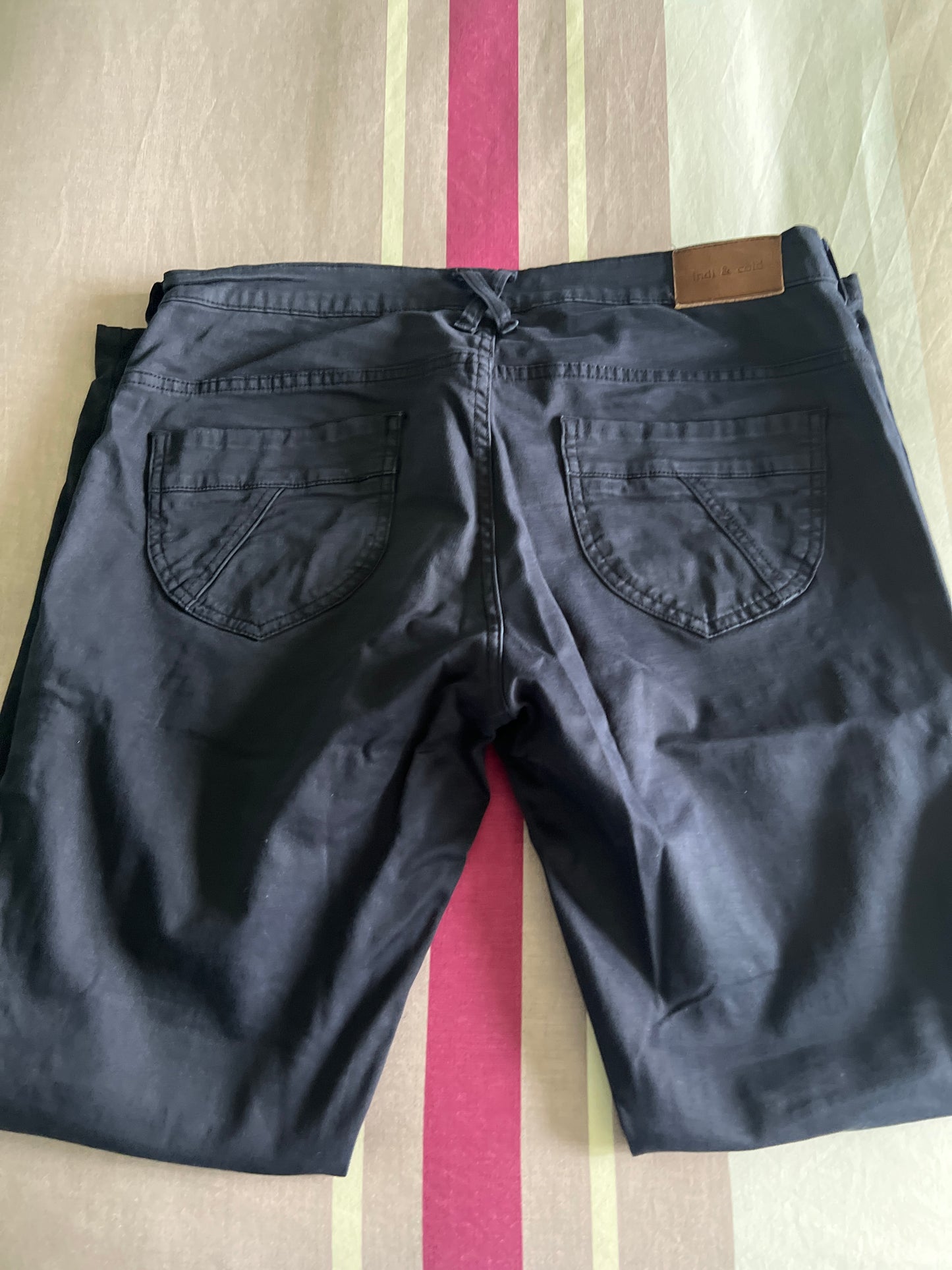 Blue trousers with zips