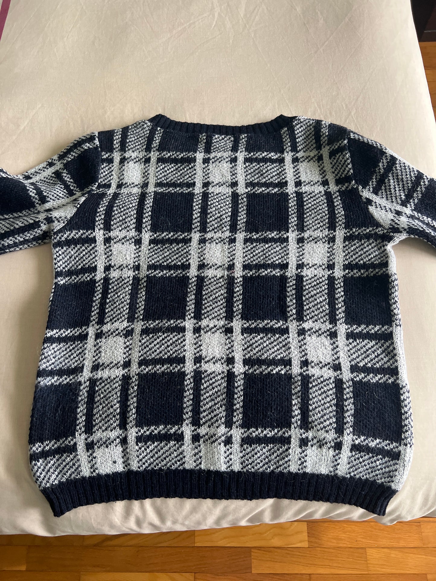 Pull à carreaux noir - blanc