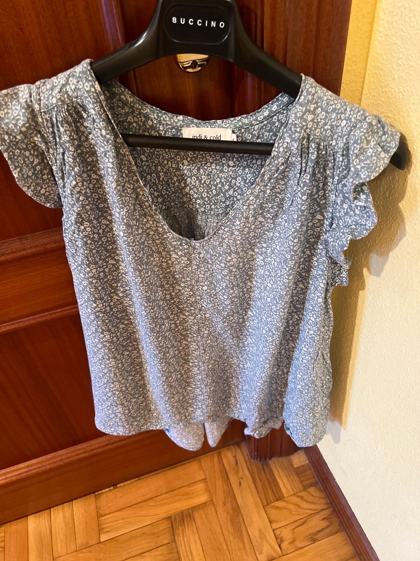 Aqua green T-shirt with white flowers