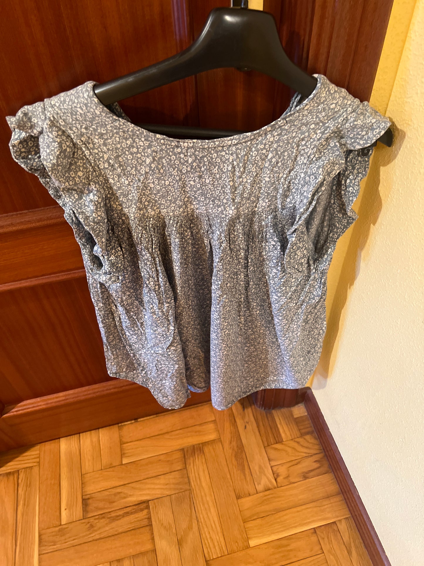 Aqua green T-shirt with white flowers